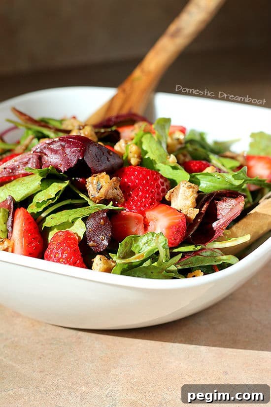 Strawberry Salad with Candied Walnuts and Rosemary Balsamic Dressing