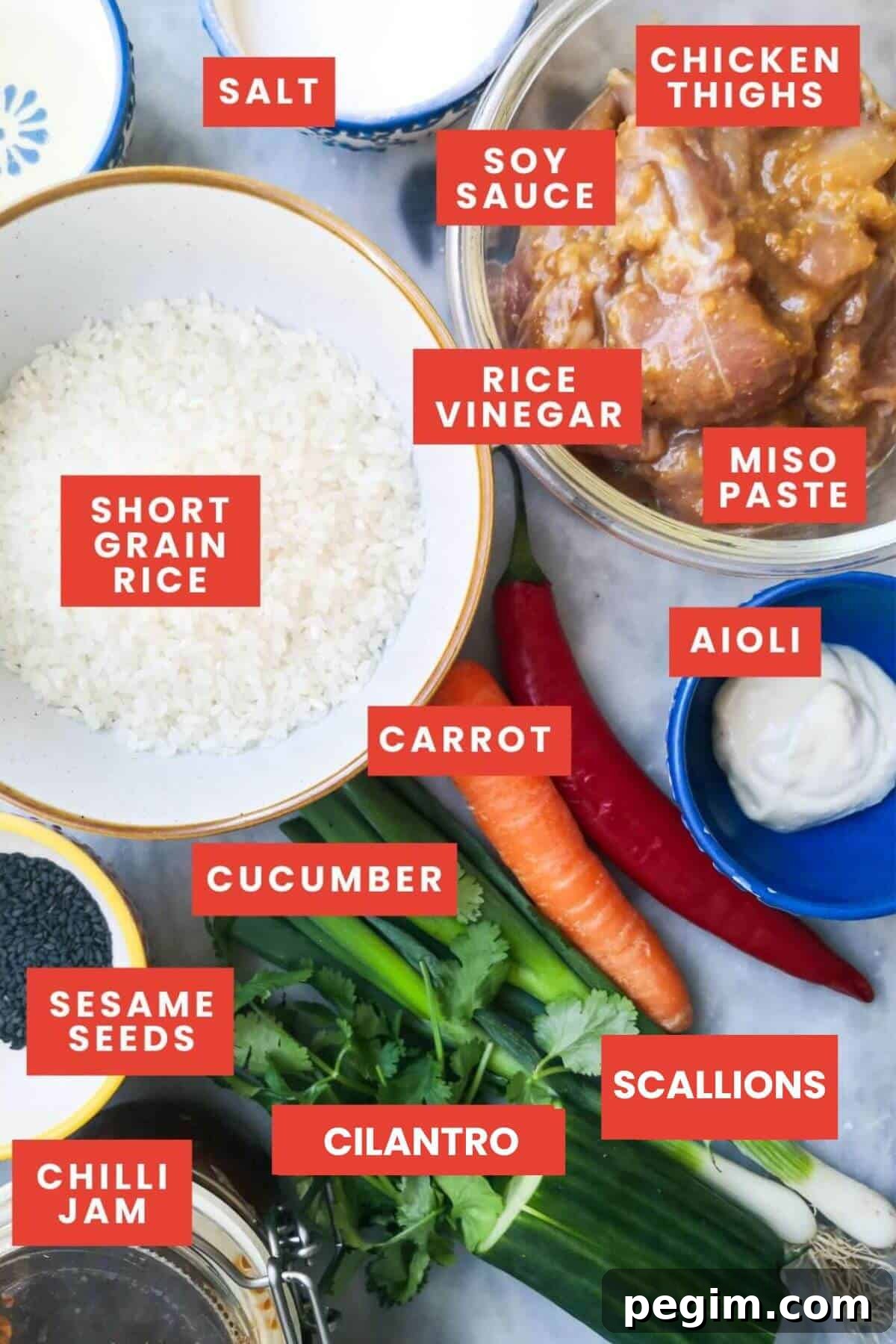 Ingredients for miso chicken poke bowls laid out and labelled.