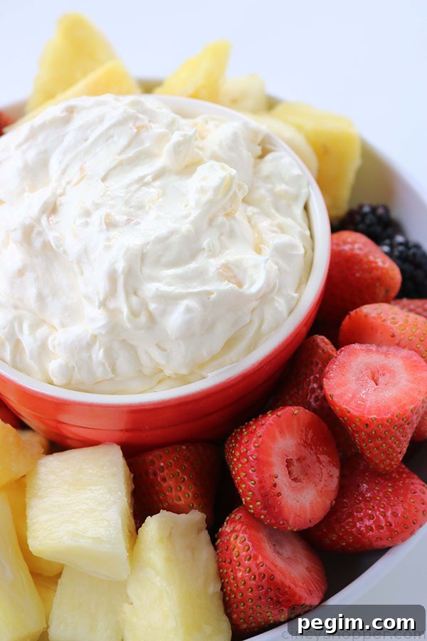 Pineapple Dip - Requires just 4 simple ingredients and can be made so quick. An easy dip that is great for dipping fruit, Nilla Wafers, and more! Super Flavor!