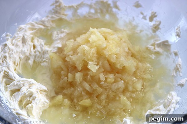 Pineapple Dip - Requires just 4 simple ingredients and can be made so quick. An easy dip that is great for dipping fruit, Nilla Wafers, and more! Super Flavor!