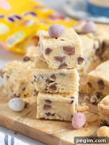 A stack of mini egg shortbread squares.