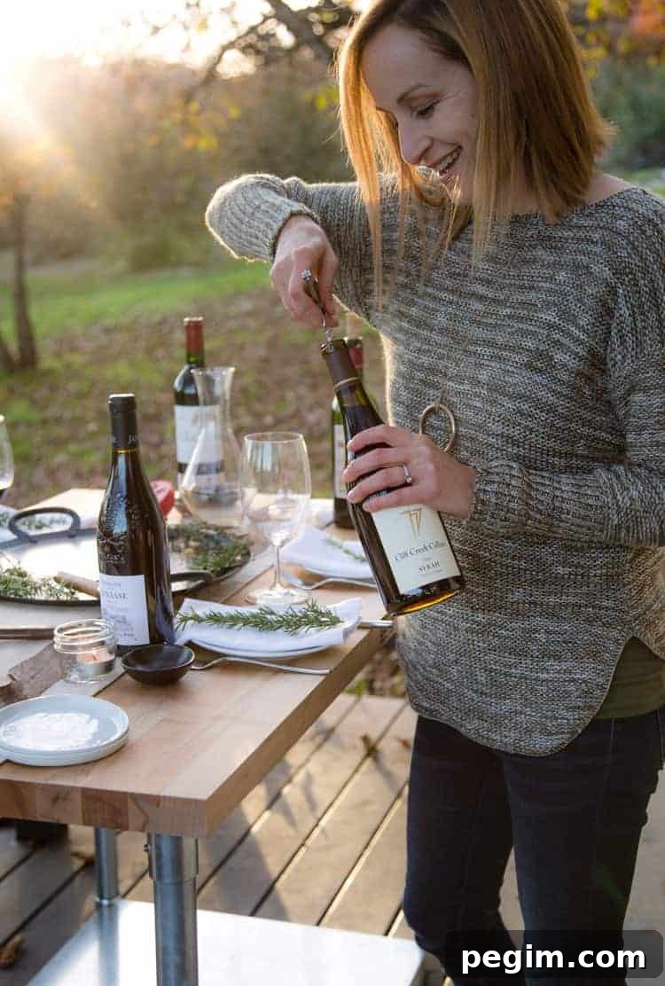 Mary Cressler opening up a bottle of wine