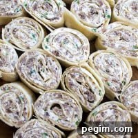 This Sausage Pinwheels Recipe is an easy, make-ahead appetizer that'll be the hit of your next party!