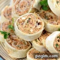 BBQ Chicken Tortilla Pinwheels piled up on a plate