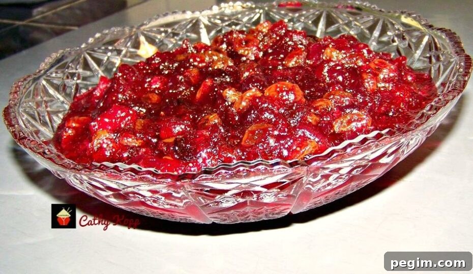 Special Cranberry Chutney. This is a wonderful recipe full of goodies! Loaded with cranberries, apple, orange, golden raisins and pecans. Only takes a very short time to make and great for freezing too! Serve as part of a dinner or with cold cuts. Always a hit at parties. | Lovefoodies.com