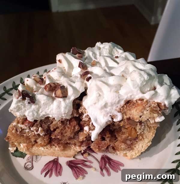 butternut brownie pie showing the pecan meringue filling