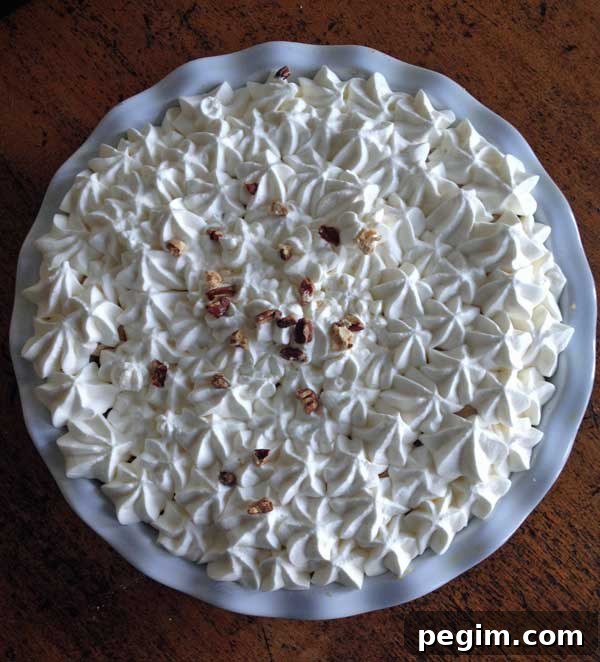 butternut brownie pie with sweetened whipped cream.