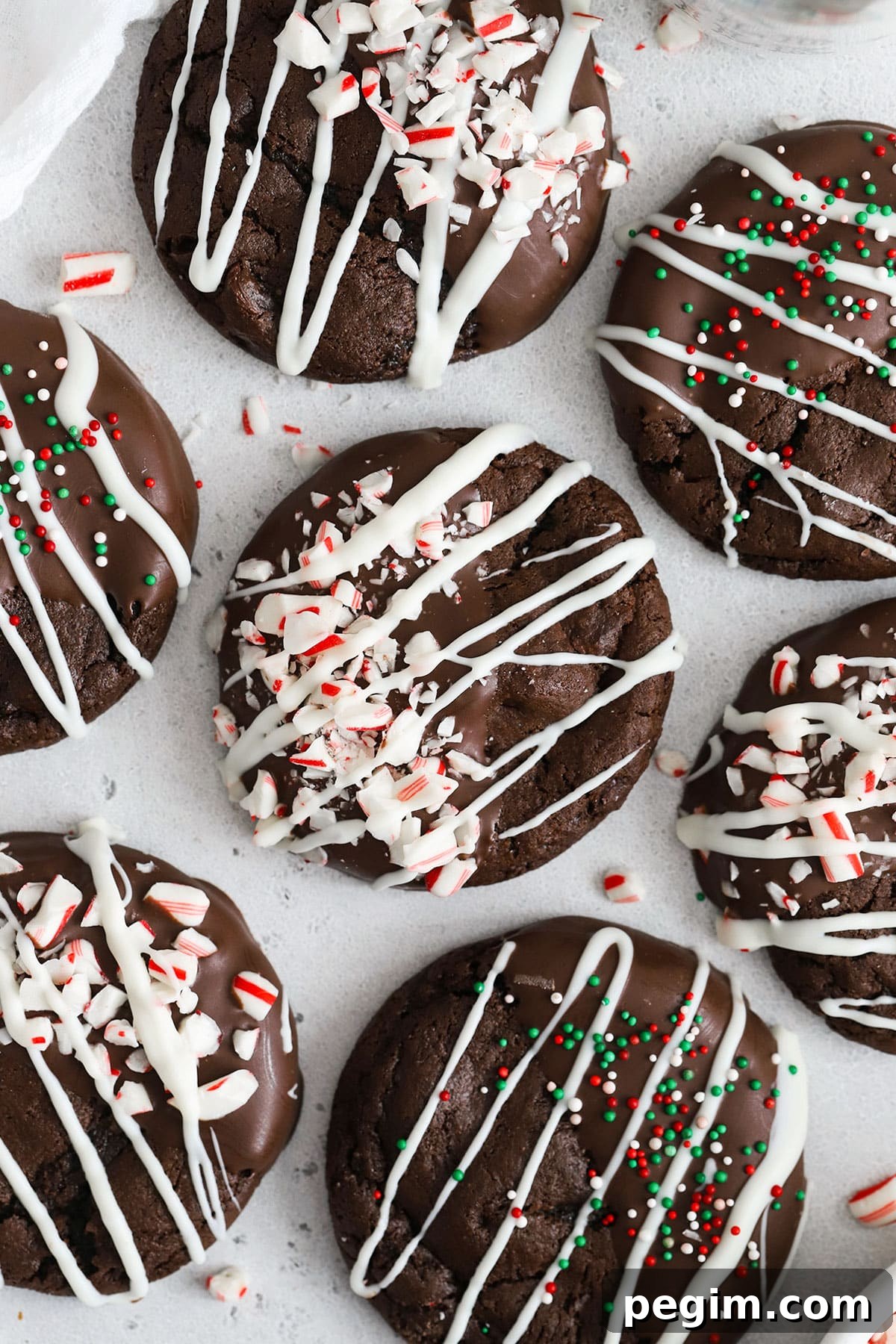 Gluten-free chocolate candy cane cookies on a white background
