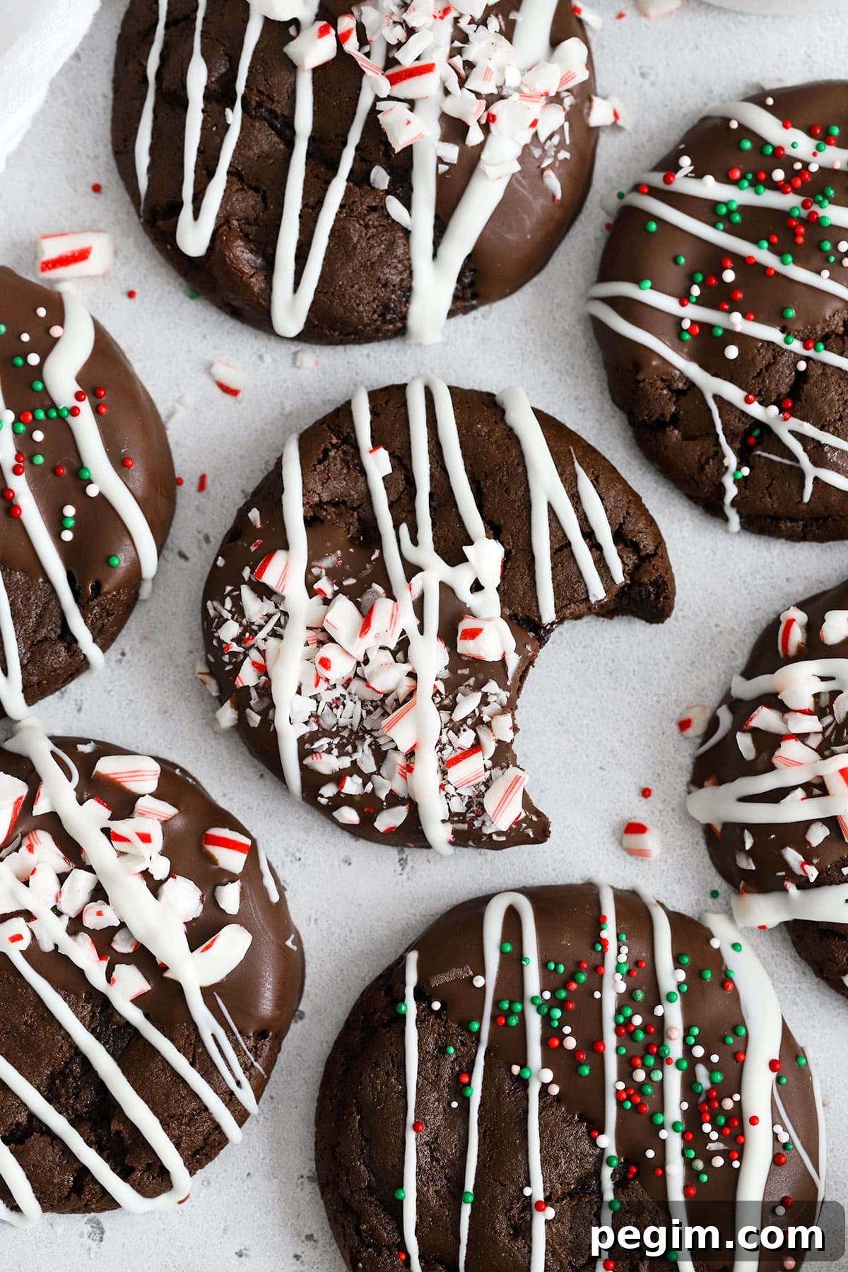 Gluten-free chocolate candy cane cookies on a white background
