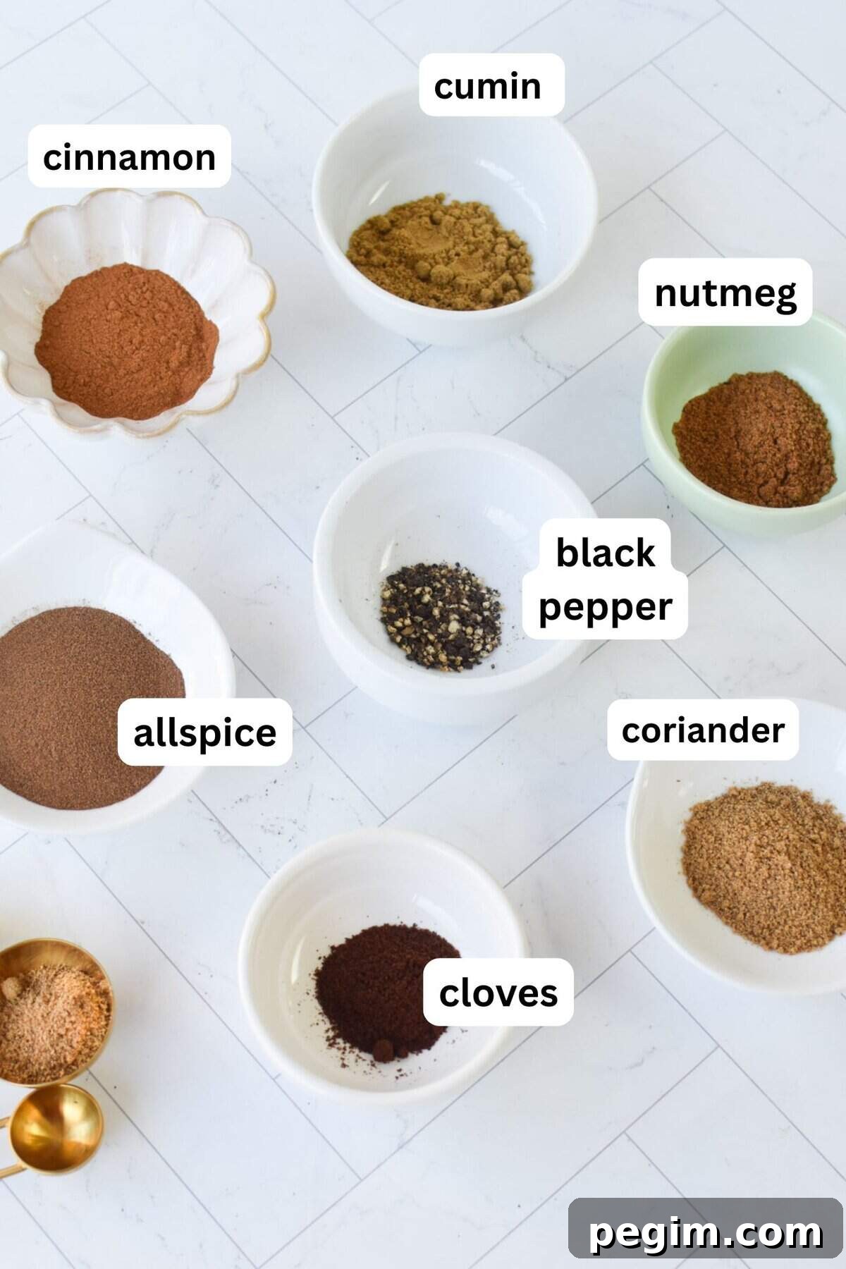 Lebanese 7 Spice Blend with spices in jars 