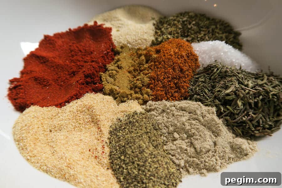 spices shown in a bowl for the homemade blackened seasoning
