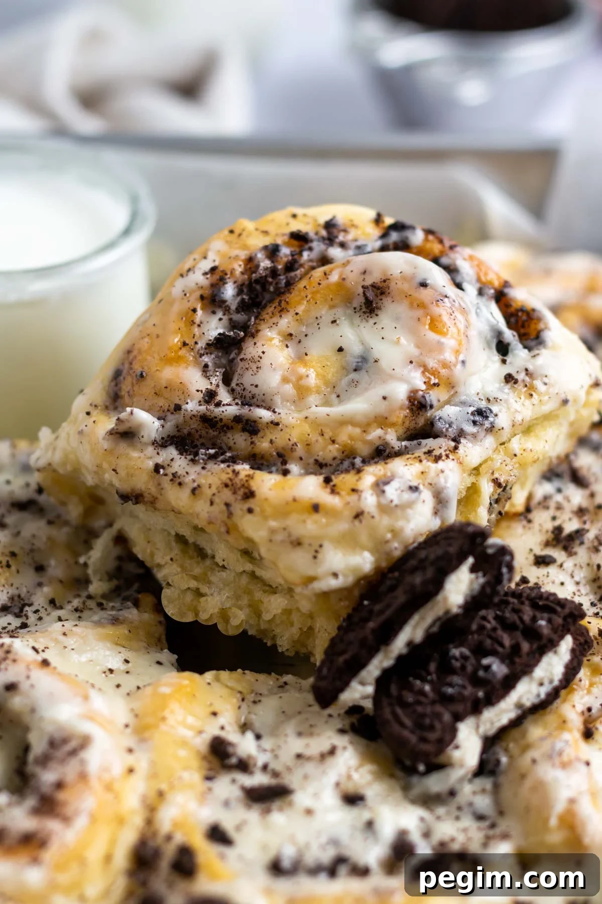 oreo cinnamon rolls with a glass of milk
