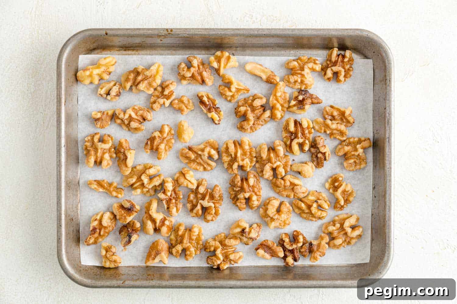 Walnuts on a sheet pan.