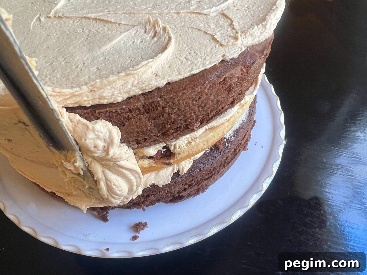 Frosting the cake.
