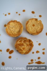 Mini Salted Caramel Cheesecakes. Little single serving cheesecakes. Super creamy, tangy and sweet with the lovely flavour of homemade salted caramel sauce! A sure winner. #saltedcaramelcheesecake #minicheesecakes #recipe