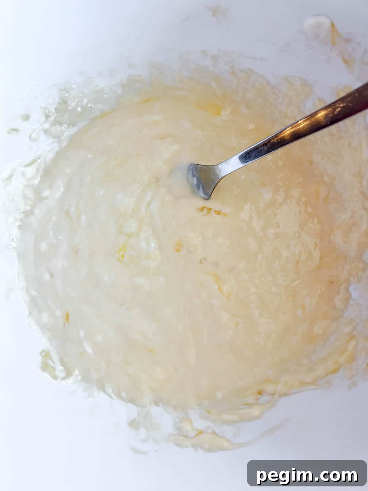 Fluffy Greek Yogurt Pancakes That Stay Light and Tender 4 Eggs and yogurt mixed together.