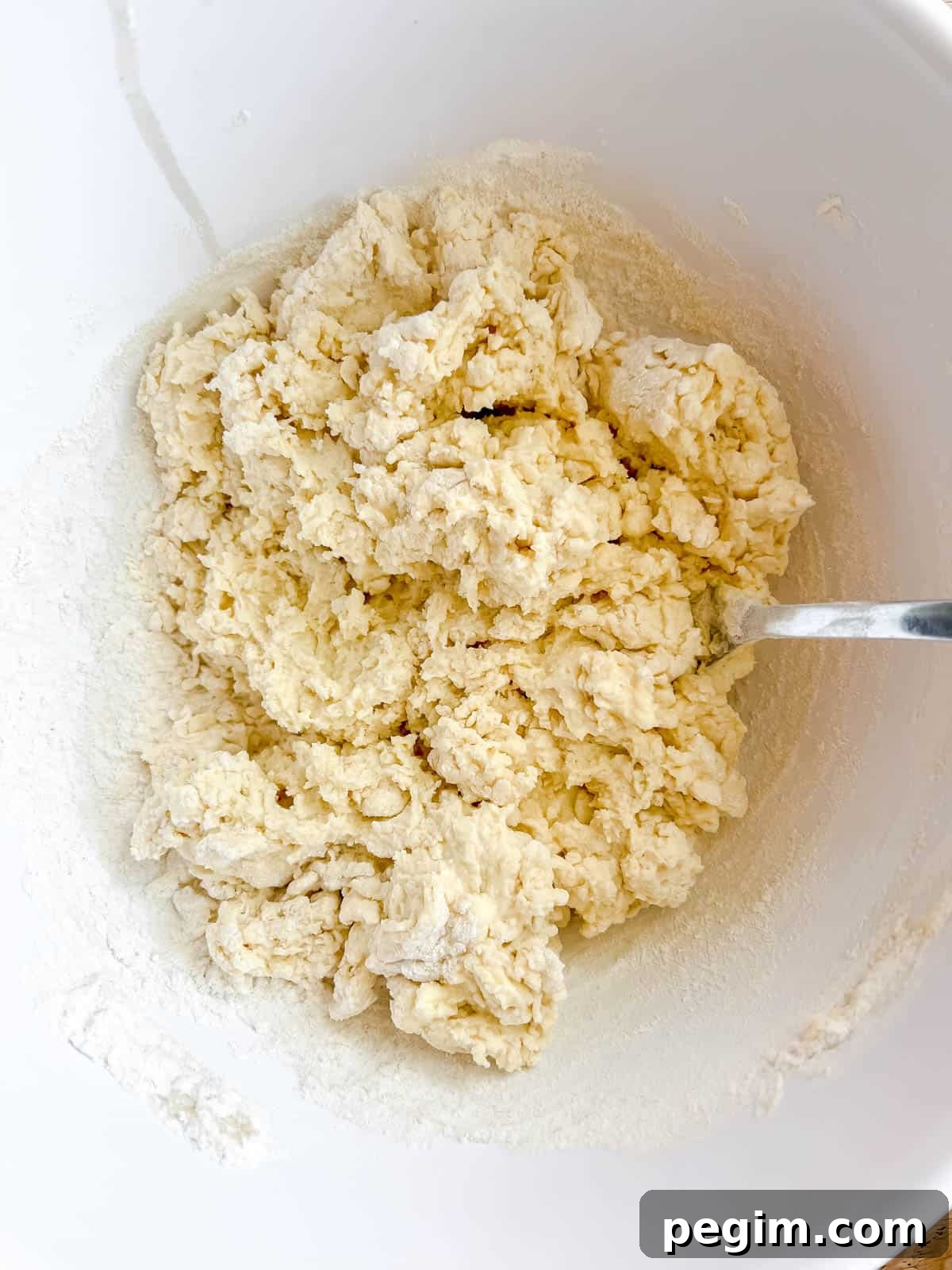 Fluffy Greek Yogurt Pancakes That Stay Light and Tender 5 Flour added to the yogurt.