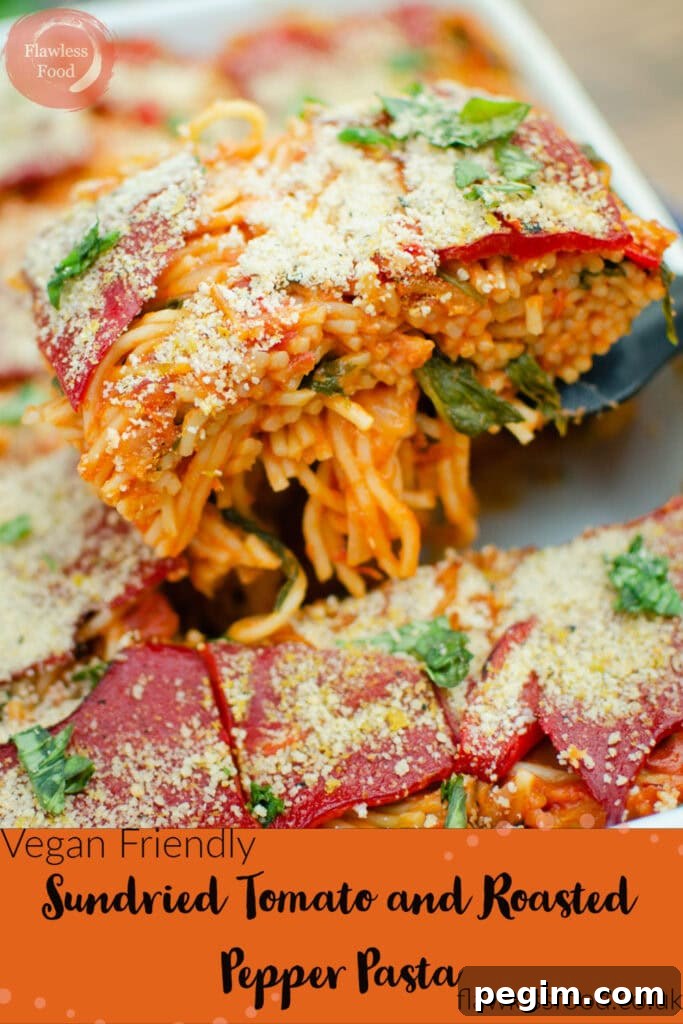 Sun-Dried Tomato & Roasted Pepper Pasta Recipe for Quick Weeknights 8 pin image of our Sundried Tomato and Roasted Pepper Pasta with the pasta bake being picked up with a black spatula