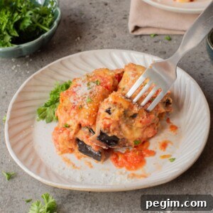 Crispy Baked Eggplant Parmesan Recipe 12 A close up image of eggplant parmesan on a plate.