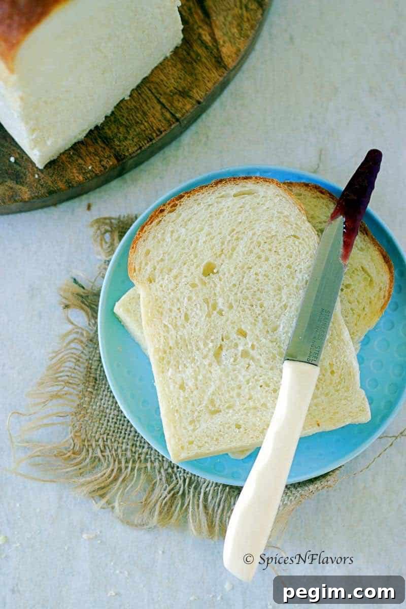 Bake Homemade White Bread in 5 Simple Steps 12 bread slices placed on a blue plate