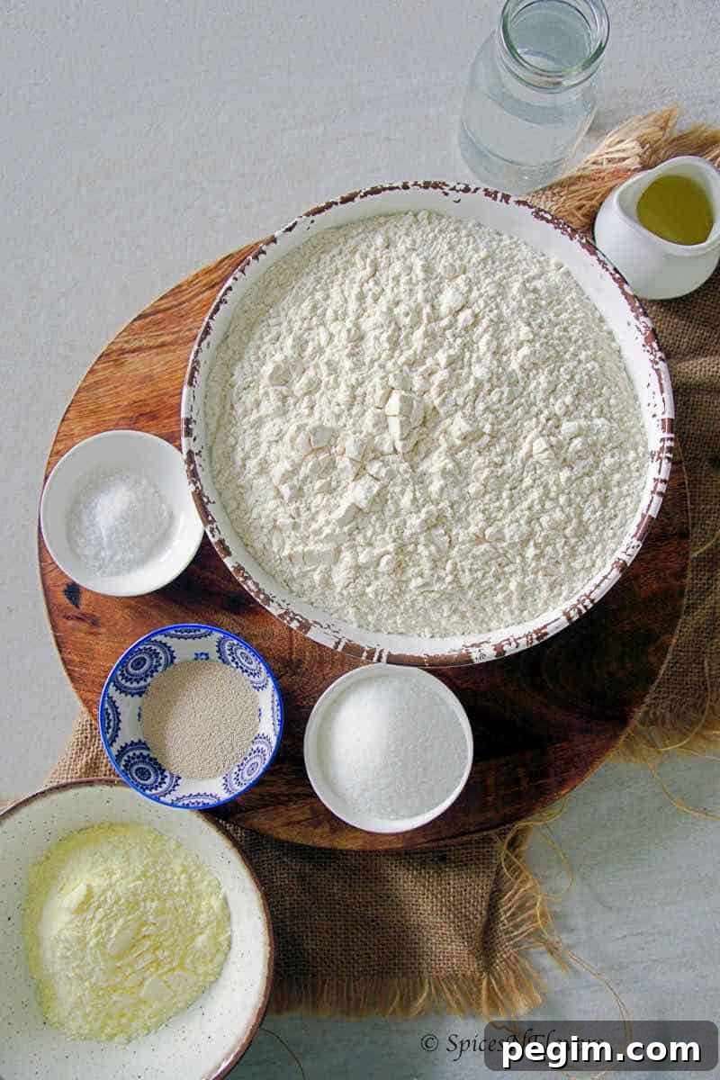 Bake Homemade White Bread in 5 Simple Steps 3 Ingredients needed to make the bread placed in different bowls