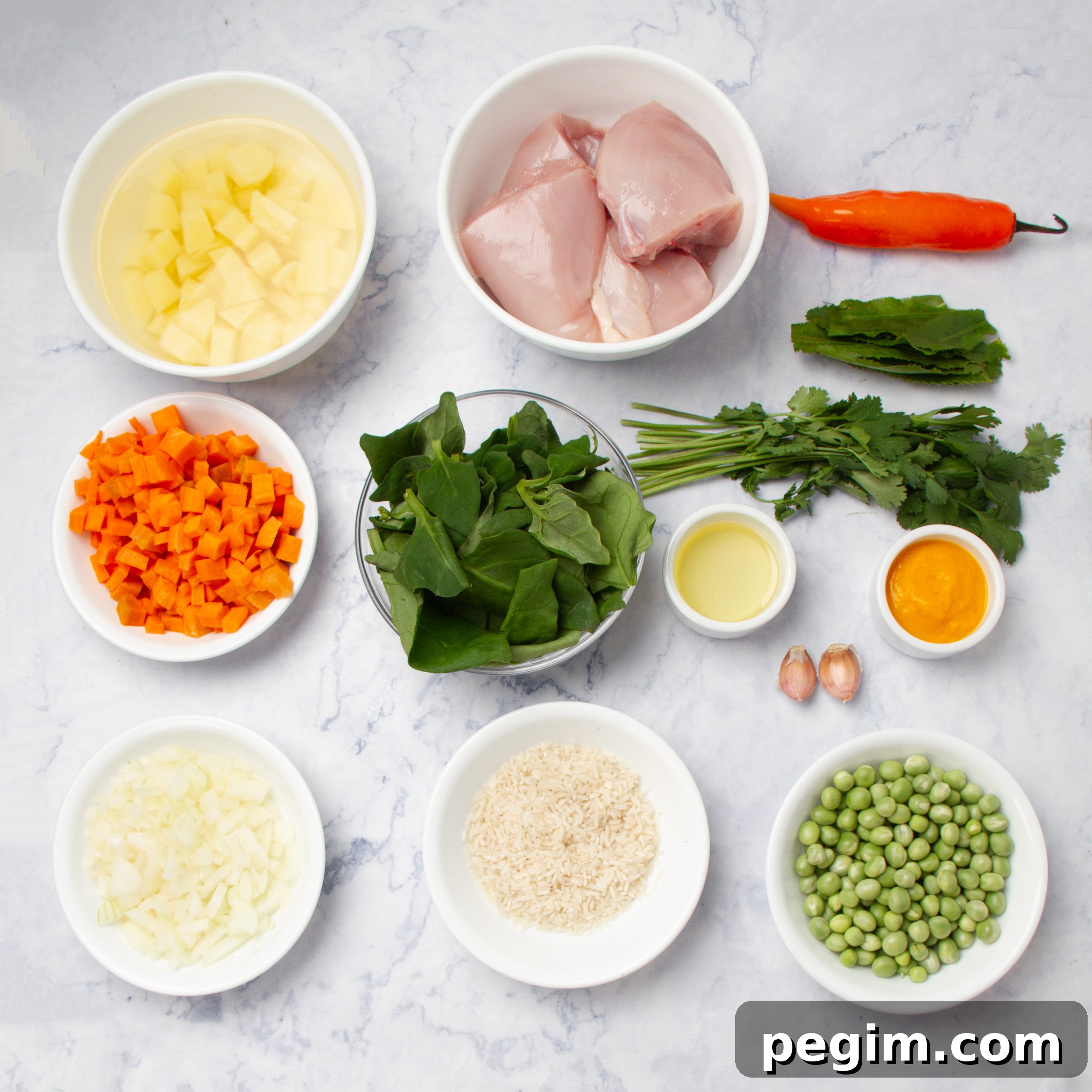 Aguadito de Pollo: Classic Peruvian Chicken Soup Recipe 3 Aguadito de Pollo ingredients in separate dishes.