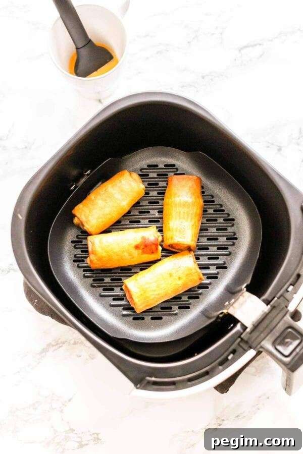 You do not need to deep fry your egg rolls or spring rolls. Get your Air Fryer out and make Air Fryer frozen egg rolls. Dip in some egg wash and fry until hot and crispy. Serve as a snack or appetizer for your Asian-inspired dinner.