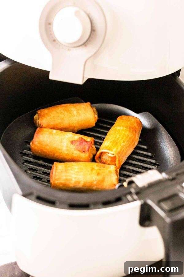 You do not need to deep fry your egg rolls or spring rolls. Get your Air Fryer out and make Air Fryer frozen egg rolls. Dip in some egg wash and fry until hot and crispy. Serve as a snack or appetizer for your Asian-inspired dinner.