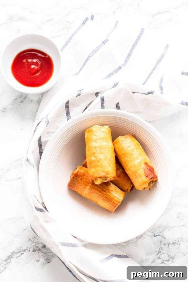 You do not need to deep fry your egg rolls or spring rolls. Get your Air Fryer out and make Air Fryer frozen egg rolls. Dip in some egg wash and fry until hot and crispy. Serve as a snack or appetizer or your Asian-inspired dinner.
