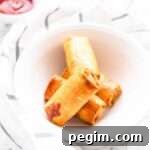You do not need to deep fry your egg rolls or spring rolls. Get your Air Fryer out and make Air Fryer Frozen egg rolls. Dip in some egg wash and fry until hot and crispy. Serve as a snack or appetiser or you Asian inspired dinner. Want to try? Visit fastfoodbistro.com for the full recipe and instructions