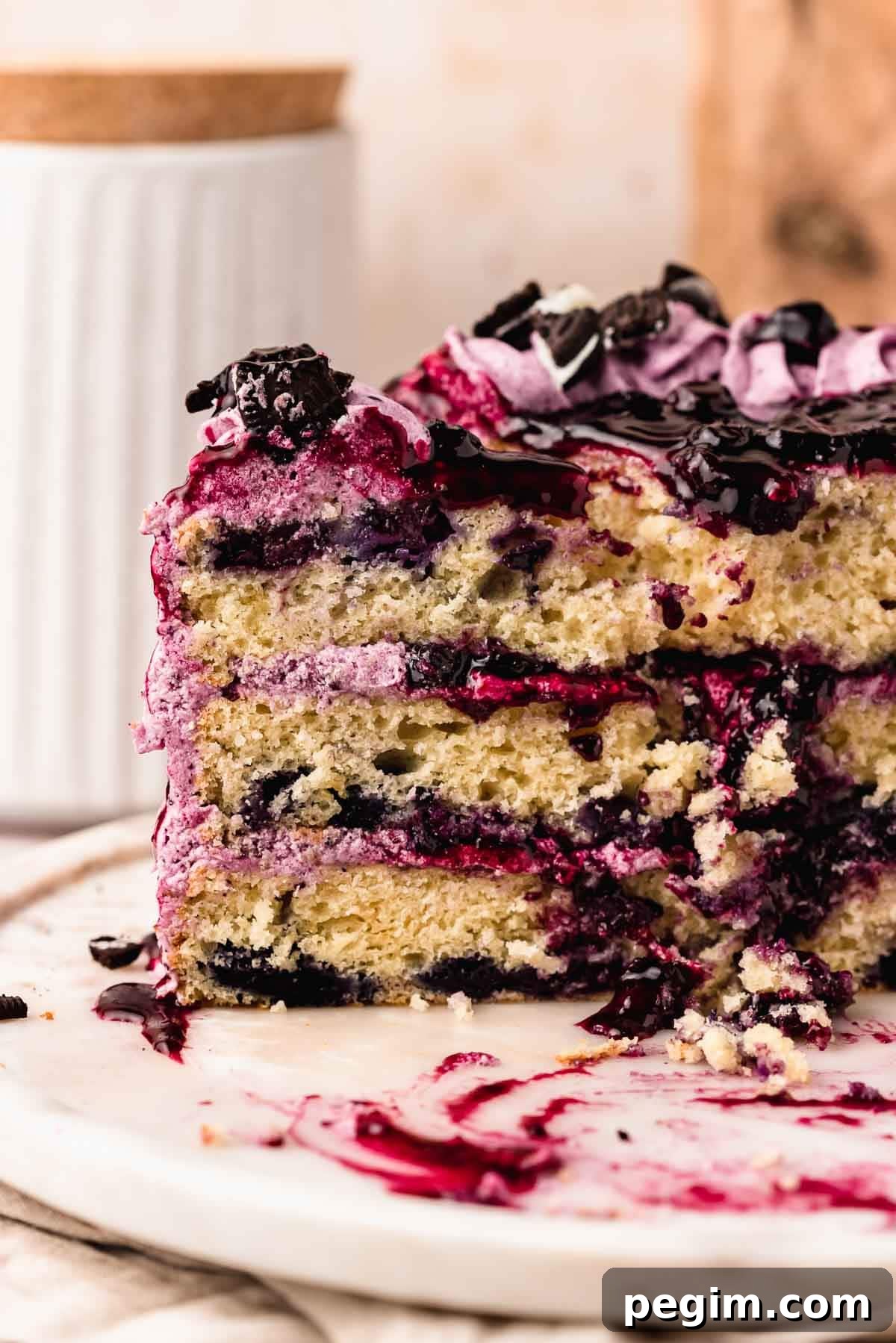 Blueberry Birthday Cake Recipe — Moist Layer Cake for Parties 2 slice of blueberry cake on plate