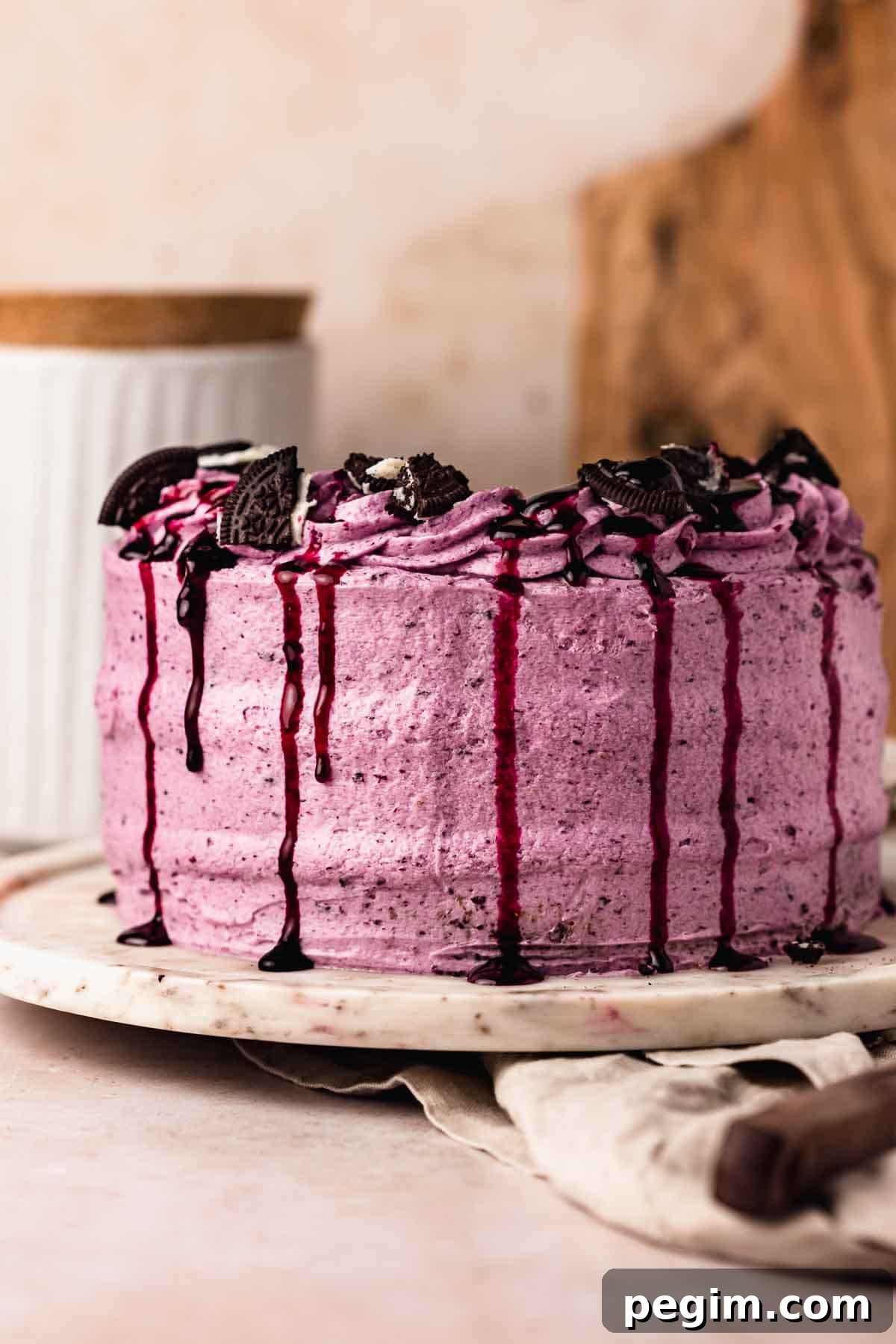 Blueberry Birthday Cake Recipe — Moist Layer Cake for Parties 3 blue blueberry cake with blueberry drip and oreos