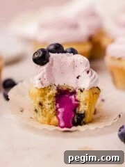 blueberry cupcake with blueberry curd filling