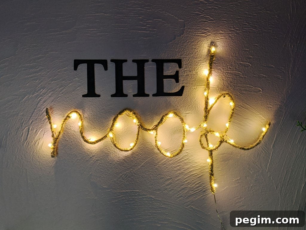 Make Wired Word Signs at Home with Free Template 14 Twinkle light wired word sign in a reading nook