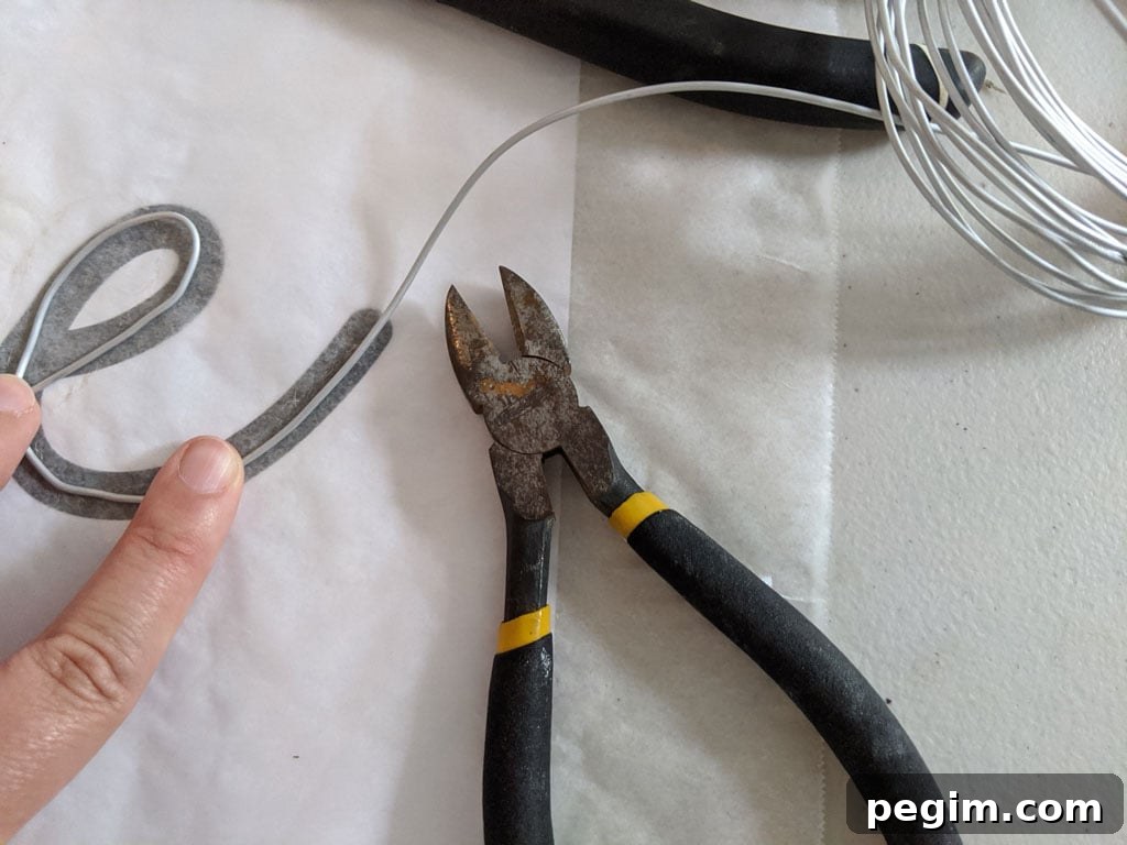 Make Wired Word Signs at Home with Free Template 6 Clipping wire end with wire snips