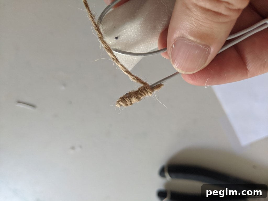 Make Wired Word Signs at Home with Free Template 7 Starting the jute wrap on the wire word