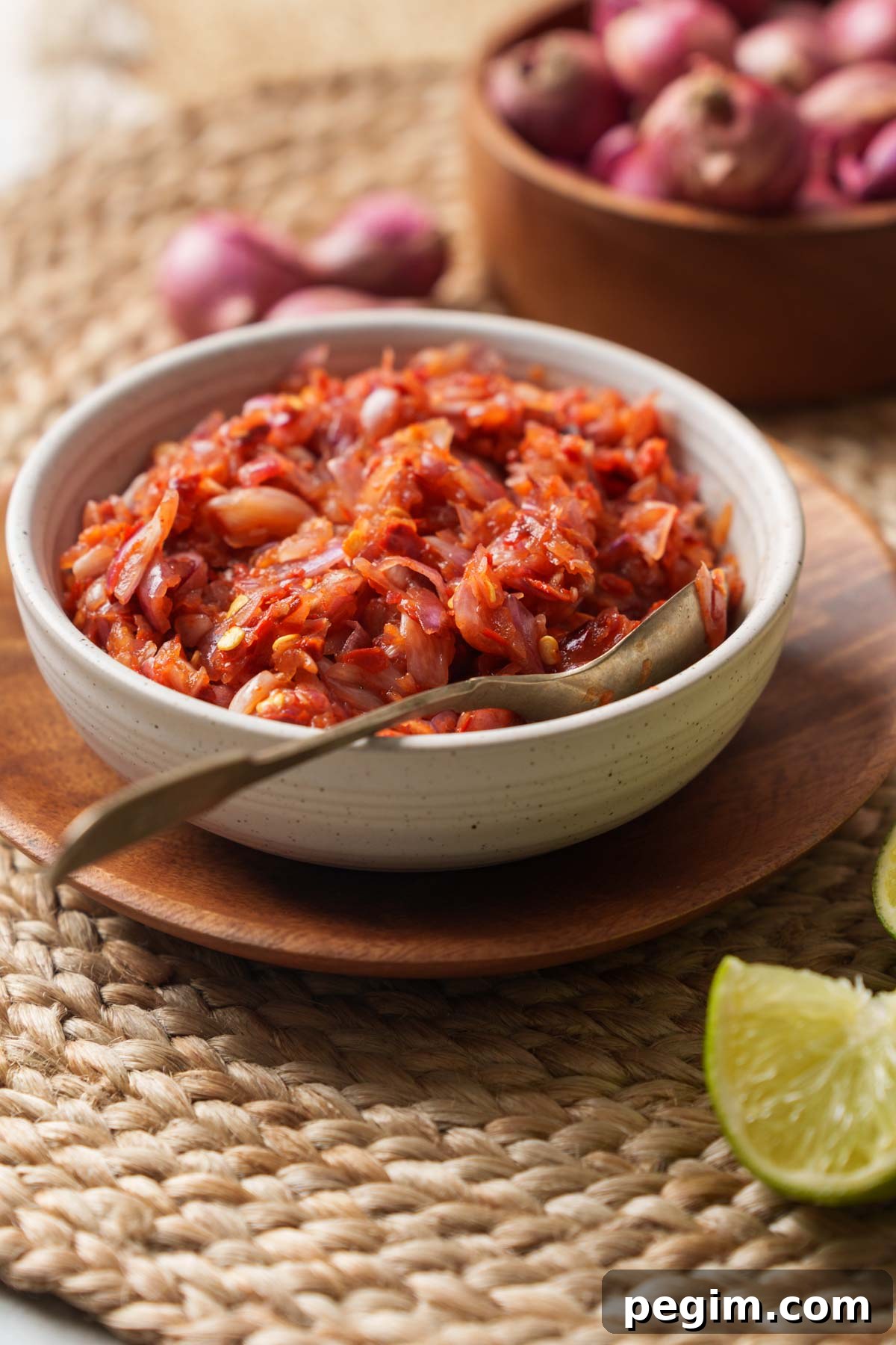 Lunu Miris: Authentic Sri Lankan Chilli and Onion Sambal 6 lunu miris or the spicy chili and onion sambal on a wooden bowl.