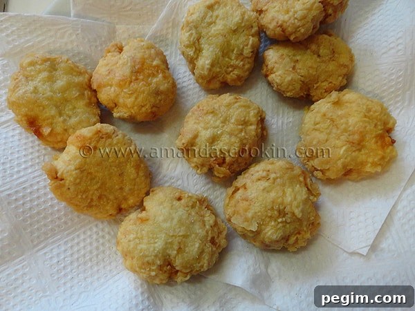 homemade-chicken-nuggets-step-15 An overhead photo of homemade chicken nuggets on a paper towel.