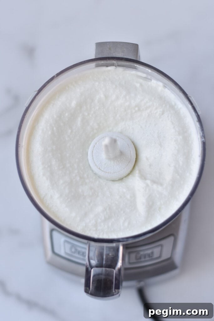 Cottage Cheese with Fruit: Tasty Breakfast and Snack Ideas 6 Cottage cheese in a food processor after whipping.