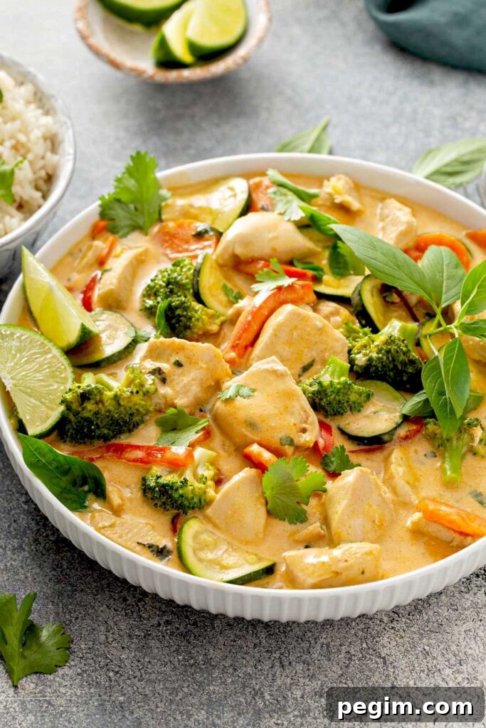Authentic Thai Chicken Curry with Coconut Milk 3 White plate with Thai curry and veggies
