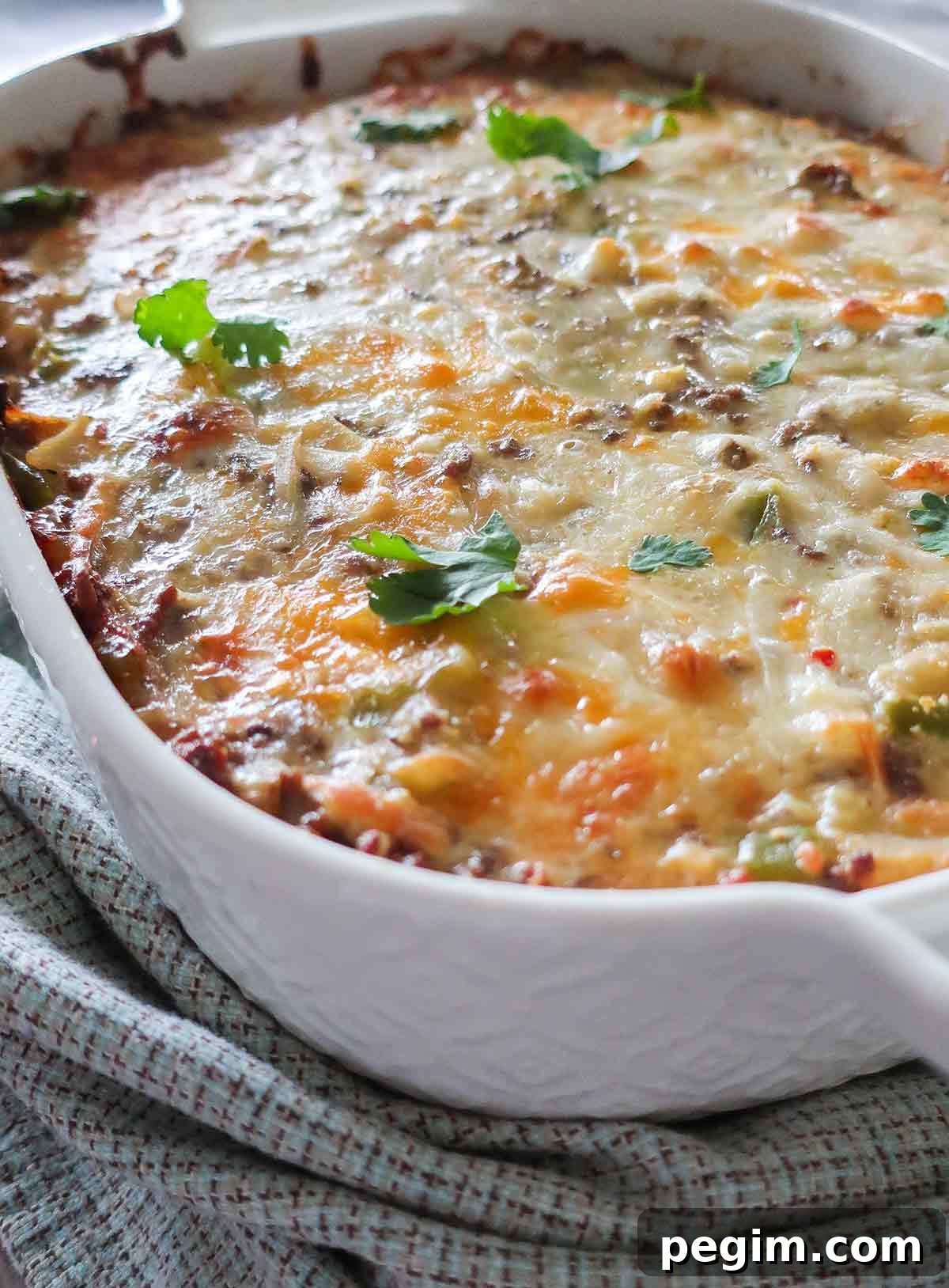 Gluten-Free Brunch Recipes for Weekend Guests 11 close up of baked sausage breakfast casserole in a dish
