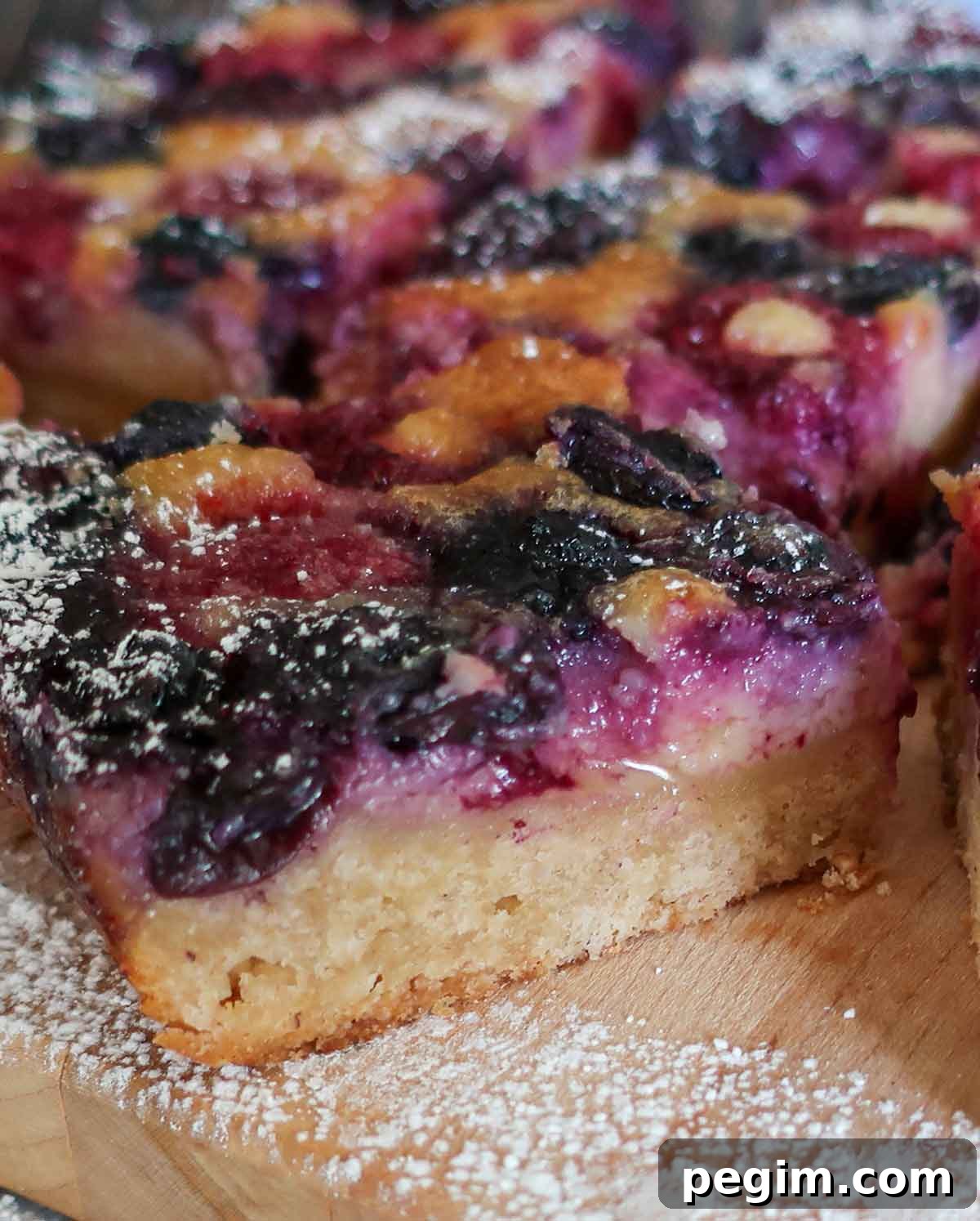 Gluten-Free Brunch Recipes for Weekend Guests 3 close up of one slice of lemon berry pudding cake