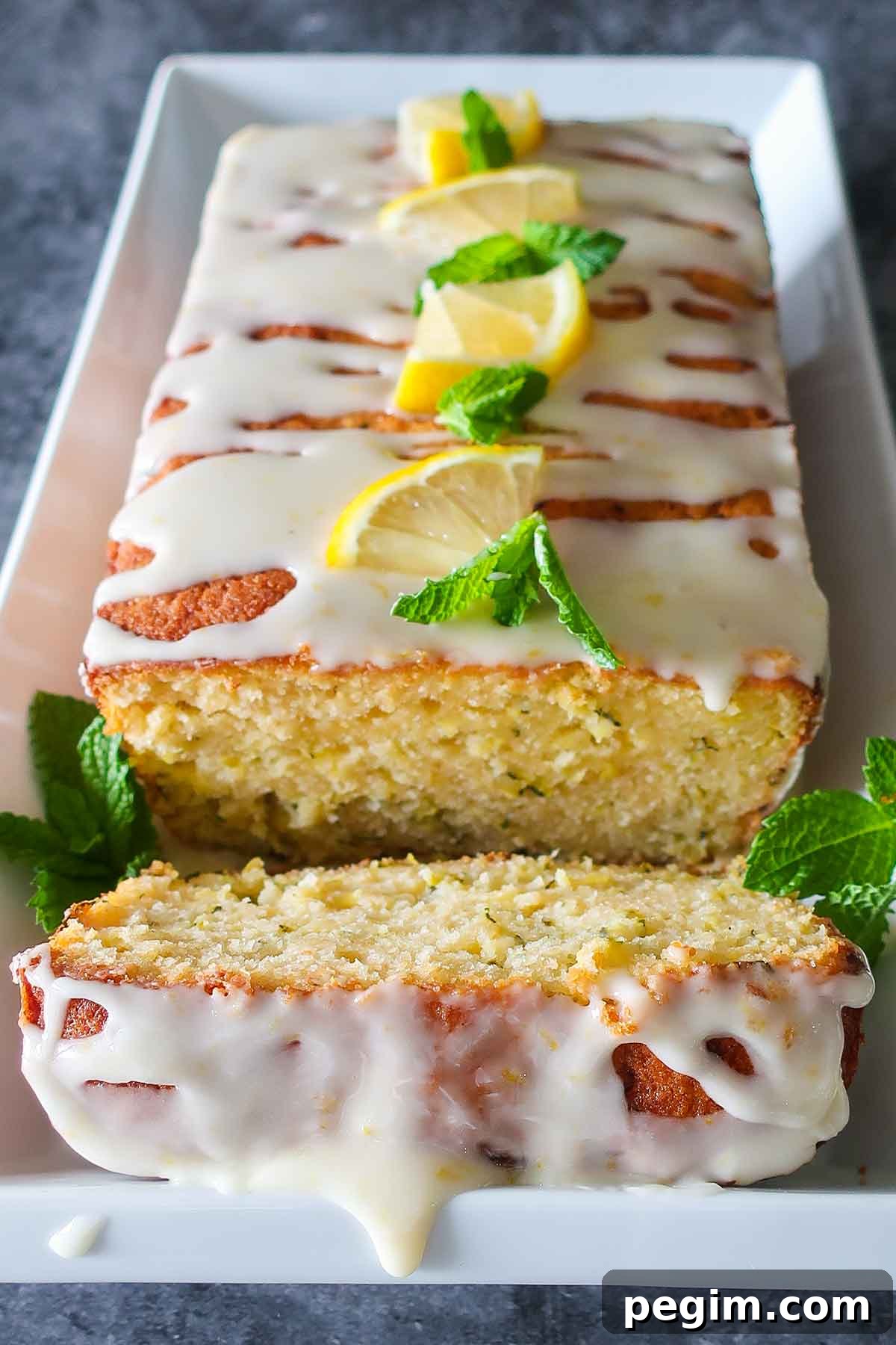 Gluten-Free Brunch Recipes for Weekend Guests 4 zucchini lemon rice flour loaf with icing and lemon slices