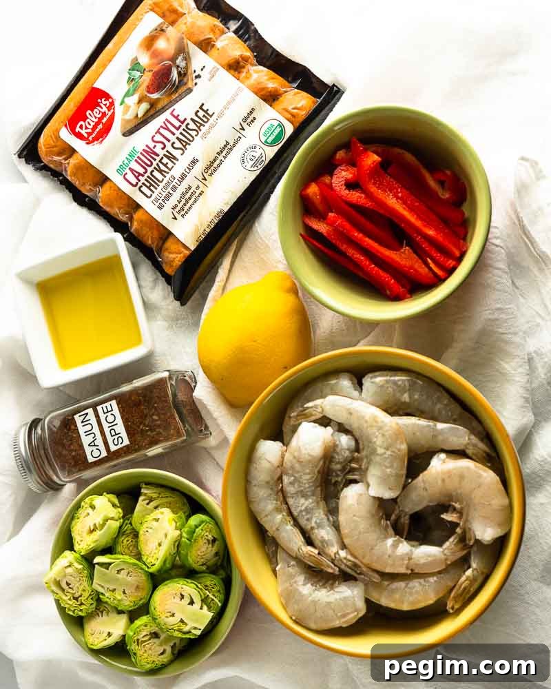 Sheet Pan Shrimp and Sausage Dinner 3 The ingredients to make Cajun shrimp and sausage sheet pan meals.