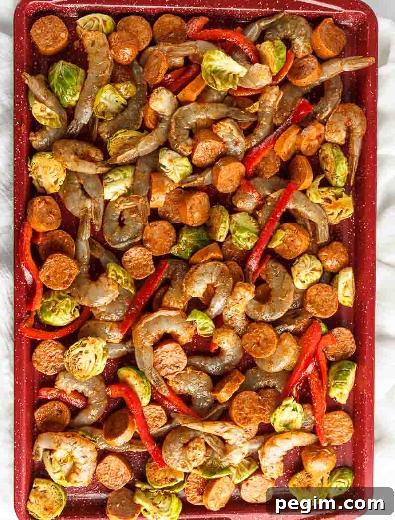 Sheet Pan Shrimp and Sausage Dinner 7 Spread across the baking sheet.