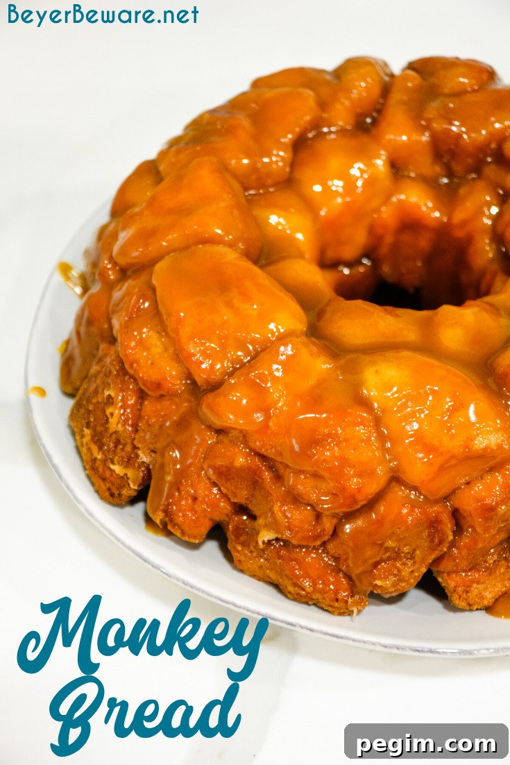 Pull Apart Caramel Monkey Bread Recipe 2 Monkey bread is a caramel pull-apart bread made with Grands biscuits, butter, sugar, and cinnamon then baked in a bundt cake pan for a gooey breakfast bread.