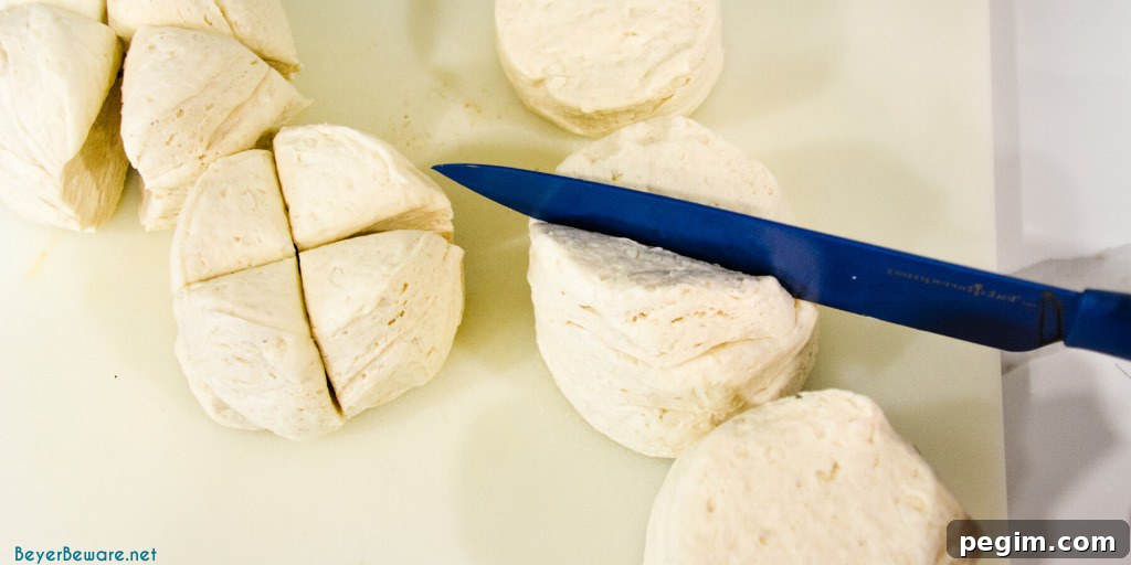 Pull Apart Caramel Monkey Bread Recipe 5 Cutting biscuits into quarters