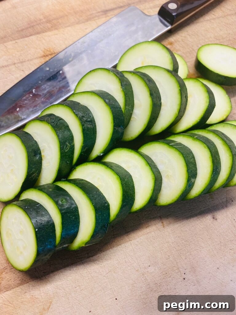 Crispy Air Fryer Zucchini Chips Recipe for Crunchy Snacks 3 sliced zucchini